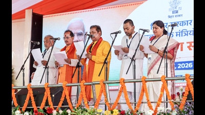 JD(U) leaders Shravan Kumar, Nishant Kumar and Lesi Singh, and BJP leaders Vijay Kumar Sinha and Dilip Jaiswal take oath during the swearing-in ceremony of the Bihar cabinet of the NDA government at Gandhi Maidan in Patna on Thursday. (PTI) JD(U) leaders Shravan Kumar, Nishant Kumar and Lesi Singh, and BJP leaders Vijay Kumar Sinha and Dilip Jaiswal take oath during the swearing-in ceremony of the Bihar cabinet of the NDA government at Gandhi Maidan in Patna on Thursday. (PTI)