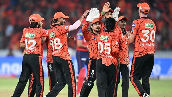 Sunrisers Hyderabad's players celebrate after the dismissal of Punjab Kings' captain Indian cricket player Shreyas Iyer during the 2026 Indian Premier League (IPL) T20 match (AFP)