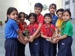 A newly-developed hybrid rose named “Tribhuvan” was unveiled on Friday during founder’s day 2026 celebrations at The Tribhuvan School in Patna. (HT photo)