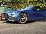 The Mercedes-AMG GT 63 Pro is a high-performance car with a long bonnet and tight tail.