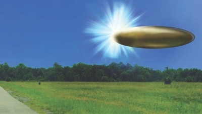 Actual site photo with FBI Lab rendered graphic overlay depicting corroborating eyewitness reports from September 2023 of an apparent ellipsoid bronze metallic object materializing out of a bright light in the sky, 130-195 feet in length, and disappearing instantaneously. (Composite sketch/ US Department of War) Actual site photo with FBI Lab rendered graphic overlay depicting corroborating eyewitness reports from September 2023 of an apparent ellipsoid bronze metallic object materializing out of a bright light in the sky, 130-195 feet in length, and disappearing instantaneously. (Composite sketch/ US Department of War)