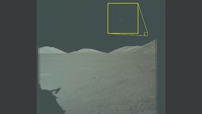 Archival imagery from the Apollo 17 mission to the Moon. The yellow box contains an enlarged area of the original photo in which three lights are visible above the lunar terrain. (NASA, via US Department of War ) Archival imagery from the Apollo 17 mission to the Moon. The yellow box contains an enlarged area of the original photo in which three lights are visible above the lunar terrain. (NASA, via US Department of War )