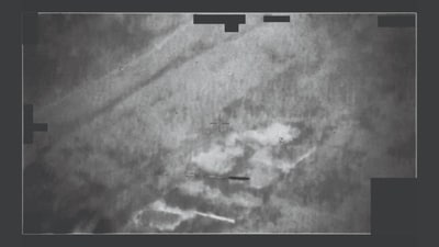Still from a video that a US military operator reported as featuring UAP flying across their screen. (US Department of War) Still from a video that a US military operator reported as featuring UAP flying across their screen. (US Department of War)