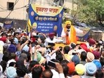 Chief minister Bhagwant Mann addressing a gathering during his Shukrana Yatra (thanksgiving march) to celebrate the enactment of the anti-sacrilege law, at Kotshamir village in Bathinda on Friday. (Sanjeev Kumar/HT) Chief minister Bhagwant Mann addressing a gathering during his Shukrana Yatra (thanksgiving march) to celebrate the enactment of the anti-sacrilege law, at Kotshamir village in Bathinda on Friday. (Sanjeev Kumar/HT)
