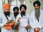 Representatives from seven gurdwaras in Sangrur’s Sunam collectively deposited 452 Gutka Sahibs and ‘pothis’ surrendered by residents at Gurdwara Nankiana Sahib on Friday. (HT)