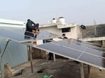Roof-top solar panels being installed in Prayagraj (HT Photo)