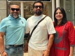 Tamil star Suriya with Malayalam actor Soubin Shahir and his wife, Jamia Zaheer. 