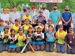 The team with the trophy in Ludhiana on Saturday. (HT Photo)