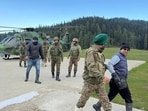 Two of the 25 tourists stranded at Sunshine Peak in Gulmarg after they were successfully rescued in a joint operation by the Baramulla police, the army’s Chinar Warriors, and the Gulmarg Development Authority on Friday.
