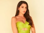Nora Fatehi in a lime green cut-out gown