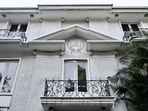 The Maharani Bagh house with a family crest