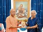 Chief minister Yogi Adityanath calls on Uttar Pradesh governor Anandiben Patel, at Jan Bhavan in Lucknow on Saturday. (HT Photo)