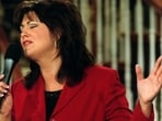 Television evangilist Joni Lamb sings a praise song during 'Celebration', a show that she and her husband Marcus host on the Daystar Network, on July 30, 2001.&nbsp;(AP (Lawrence Jenkins/The Dallas Morning News via AP))