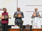 Union Home Minister Amit Shah, CJI Surya Kant, Attorney General of India R Venkataramani and others during the book launch event of the books penned by Solicitor General of India Tushar Mehta (R),