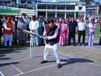 Uttarakhand Chief Minister Pushkar Singh Dhami plays cricket after inaugurating the upgraded cricket ground at Surendra Singh Valdiya Stadium in Pithoragarh on Sunday.
