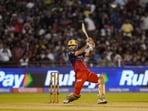 Bhuvneshwar Kumar plays a shot during the IPL 2026 match between MI and RCB. 