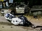 Wreckage of a sports bike and a car is seen after they collided, in Mahbubnagar district, Telangana, late Sunday, May 10, 2026. 