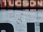 TUCSON, ARIZONA - MARCH 01: Notes for Nancy Guthrie are written on a banner that is displayed in front of the KVOA television station on March 01, 2026 in Tucson, Arizona. (Photo by JUSTIN SULLIVAN / GETTY IMAGES NORTH AMERICA / Getty Images via AFP)