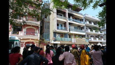 A crowd gathers outside the residential building after a fire broke out, killing nine people, at Vivek Vihar in New Delhi on May 3. (HT photo) A crowd gathers outside the residential building after a fire broke out, killing nine people, at Vivek Vihar in New Delhi on May 3. (HT photo)