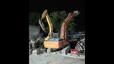 According to PCMC officials, 4,336.28 sq ft of unauthorised construction was removed during the operation. (HT) According to PCMC officials, 4,336.28 sq ft of unauthorised construction was removed during the operation. (HT)