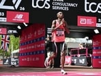 Kenya's Sabastian Sawe crosses the line to win the men's race in London Marathon. 