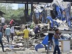 Authorities began demolishing homes alleged to be illegal, some of which residents claim have existed since 1949, leading to evictions on Tuesday. (Anshuman Poyrekar/HT Photo)