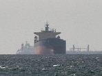 Cargo ships in the Gulf, near the Strait of Hormuz, amid the US-Israeli conflict with Iran. (REUTERS)
