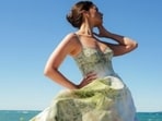 Alia Bhatt embraced a princess-like aesthetic for her first Cannes 2026 look. In the latest photoshoot, she was all smiles, radiantly glowing and posing in front of the sea.&nbsp;(Picture credit: Instagram/@aliabhatt)