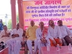 Priests, traders and locals at the protest site. (HT Photo)