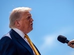 US President Donald Trump speaks to members of the media on the South Lawn of the White House before boarding Marine One in Washington, DC.