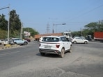 Traffic police are assessing signal cycles, roadside parking and encroachments that narrow carriageways near the junction. (Parveen Kumar/HT)