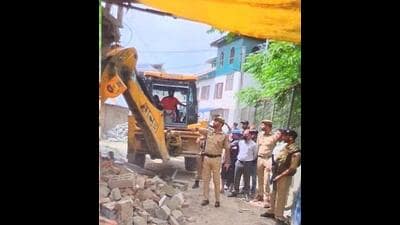 A demolition of a structure linked to drug proceeds underway in Baramulla district. The J&K administration’s crackdown has led to the demolition of 37 houses and structures so far, with 24 of these actions in Kashmir alone. A demolition of a structure linked to drug proceeds underway in Baramulla district. The J&K administration’s crackdown has led to the demolition of 37 houses and structures so far, with 24 of these actions in Kashmir alone.