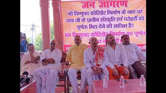 Priests, traders and locals at the protest site. (HT Photo)