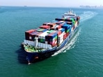A cargo ship sailing into a port amid the West Asia conflict.(AFP)