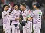 Gujarat Titans' Rashid Khan, captain India's Shubman Gill, England's Jos Buttler and India's Washington Sundar celebrate after their team's win.