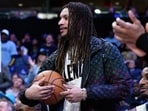 Former Memphis Grizzlies forward Brandon Clarke looks on from the bench in the second half of an NBA basketball game against the Minnesota Timberwolves