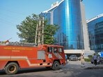 Officials said the blaze started in an air-conditioning vent and was controlled before it could spread to other parts of the building. (Parveen Kumar/HT)