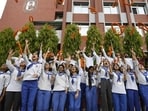 Students of Lucknow Public School erupt in joy after CBSE Class 12 results were declared on Wednesday. (HT Photo)