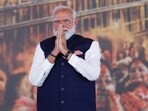 Prime Minister Narendra Modi gesutres as he attends a swearing-in ceremony of Suvendu Adhikari 