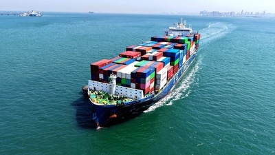 A cargo ship sailing into a port amid the West Asia conflict. (AFP) A cargo ship sailing into a port amid the West Asia conflict. (AFP)