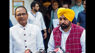 Union agriculture minister Shivraj Singh Chouhan with Punjab chief minister Bhagwant Mann in New Delhi on Wednesday. (PTI) Union agriculture minister Shivraj Singh Chouhan with Punjab chief minister Bhagwant Mann in New Delhi on Wednesday. (PTI)