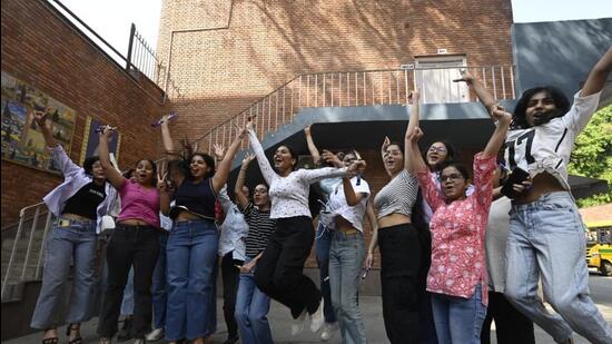 Students celebrate CBSE Class XII Results in St Thomas School in Mandir Marg. (HT Photo/Sanjeev Verma)