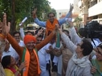 BJP mayoral candidate Shyam Lal Bansal with party workers and supporters in Panchkula on Wednesday. (Sant Arora/HT)