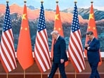 US President Donald Trump (left) with China's Xi Jinping in Beijing on Thursday.