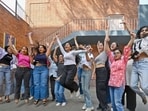 Students celebrate in a joyous mood after the declaration of the CBSE Class XII results at the premises of St. Thomas' School, in New Delhi.