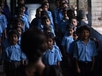 School children sing the national anthem and Vande Mataram during their morning assembly. (HT File)