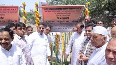 Following a request from Noida MLA Pankaj Singh to ensure a permanent resolution of sewer overflow problems, and the damaged sewer lines at various locations, the Noida authority’s water department organised a foundation stone laying event of projects. (HT Photo)