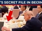 Donald Trump’s Beijing visit has triggered another viral controversy after a banquet clip appeared to show the U.S. President peeking into Xi Jinping’s open file during a state dinner. Donald Trump’s Beijing visit has triggered another viral controversy after a banquet clip appeared to show the U.S. President peeking into Xi Jinping’s open file during a state dinner.