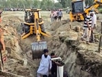 Rescue operations underway after a child fell into a borewell at the Chak Samana village near Bhikhowal, in Hoshiarpur Rescue operations underway after a child fell into a borewell at the Chak Samana village near Bhikhowal, in Hoshiarpur