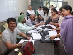 Census duty kits being distributed to the employees in Government Rajindra College in Bathinda. (Sanjeev Kumar/HT)